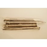 A Victorian silver coloured combination dip pen and propelling pencil, with a stone set seal end,