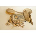 A collection of assorted silver and silver coloured items, including; a hand mirror; hair brush;