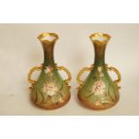 A pair of 20th century Carlton Ware vases with decorative painted relief decoration, H 20.25cm,