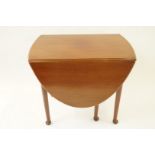 A 20th century mahogany drop leaf table in George I style on turned tapering legs and pad feet, H