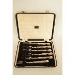 A set of six cake forks, the steel tines to loaded silver Queen's pattern handles, Sheffield 1968,