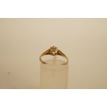 A single stone diamond 9 carat gold ring, the single cut stone illusion set, finger size L, 1 g