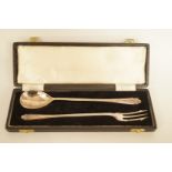 A silver pickle fork and olive spoon set, Sheffield 1959, cased, fork 18.5 cm long, 57 g gross