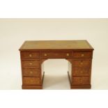 An Edwardian mahogany marquetry pedestal desk with leather inset top, H 76cm W 121cm D 57cm