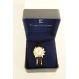 A lady's Krug-Baumen Principle stainless steel chronograph wrist watch, the rayed dial with blued