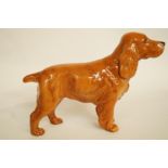 A Beswick figure of a Spaniel, printed marks in black, printed mark "Horseshoe formula" H 14cm