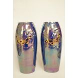 A pair of Devon Fieldings lustre glazed vases, printed in gilt and blue with butterflies, printed