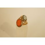 A coral cameo ring, finger size I; with a 9ct gold hardstone cameo ring, Chester 1912, finger size