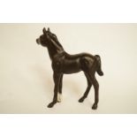 A Beswick figure of a bay foal with matt glaze printed marks in black, H 12.75cm, and another of a