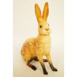 A Beswick figure of a large seated hare, printed marks in black impressed model number 1025, H 18cm