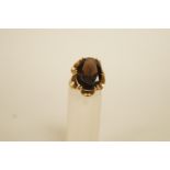 A smoky quartz 9 carat gold dress ring, finger size L, 5.9 g gross