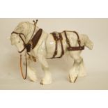 A Beswick harnessed large action shire horse in grey, 2578; harness damaged; printed marks in