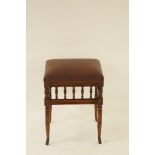 An Edwardian mahogany stool with turned uprights, H 54cm W 40cm D 33cm