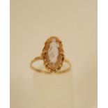 A shell cameo 9 carat gold ring, Birmingham, date letter rubbed,  finger size O, 2.3 g gross