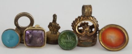 A 19th century three colour gold seal with amethyst matrix,
