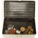 A metal tackle box containing brass and vintage reels