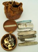 A silver cased pen knife, Sheffield 1929; another silver cased pen knife; four other pen knives,