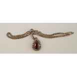 An Edwardian garnet and diamond pendant,