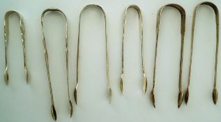 A collection of six silver sugar tongs, comprising; one late 18th century example, makers mark G.S.