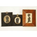 A collection of Victorian silhouettes to include, a framed silhouette of a standing gentleman,