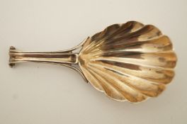 A George IV silver caddy spoon, makers mark worn, London 1827,