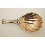 A George IV silver caddy spoon, makers mark worn, London 1827,