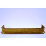 A Victorian brass fender with half reeded design, 14cm high, 119cm wide,