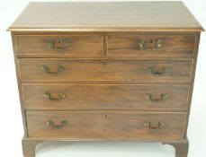 A George III mahogany chest of two short and three long graduated boxwood strung drawers, 86cm high,