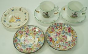 A pair of Crown Staffordshire Nursery rhyme cups and saucers,