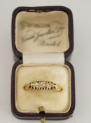 A five stone diamond 18 carat gold ring, Birmingham, date letter obscured, finer size N, 3g gross,