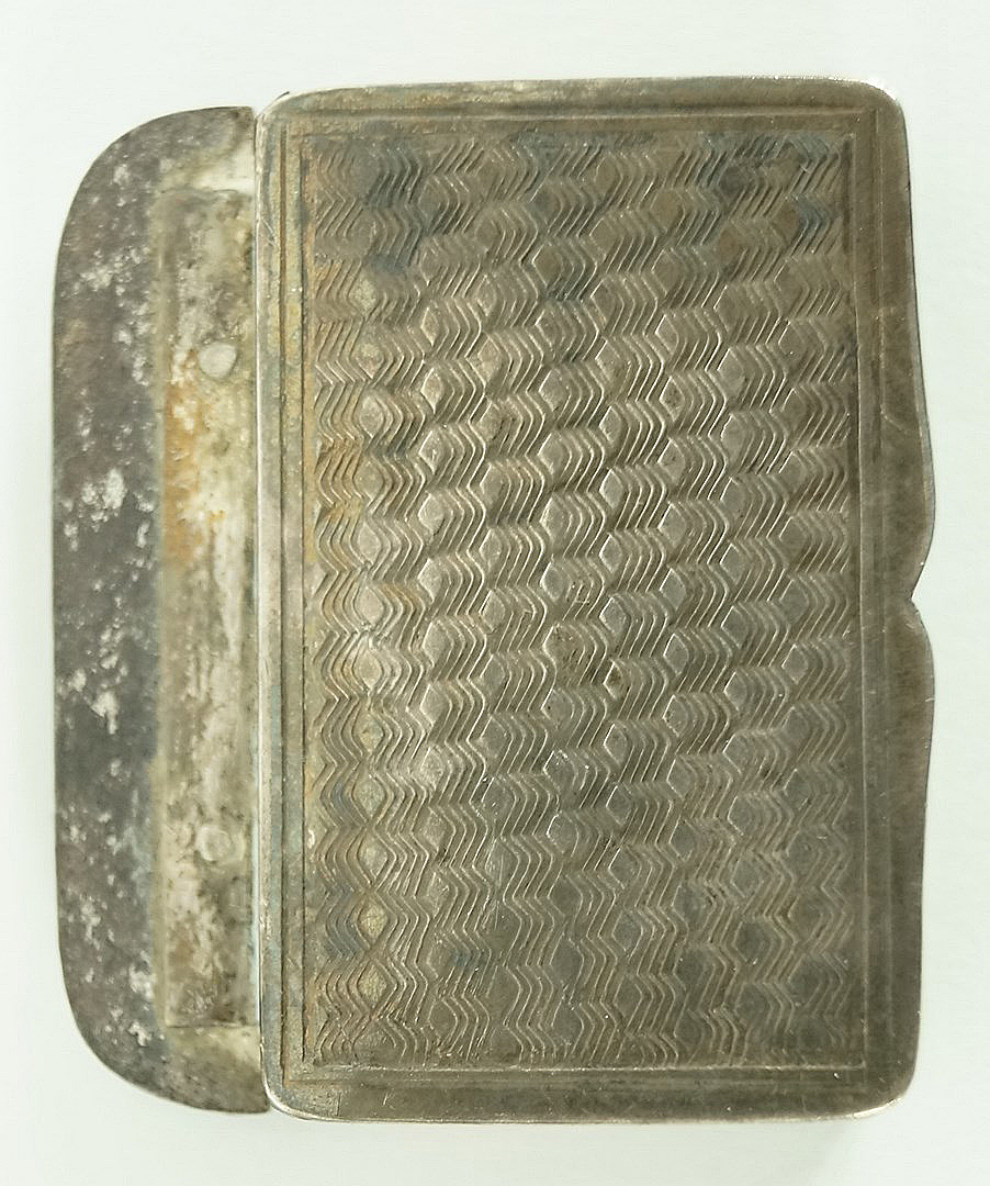 An unusual silver coloured vesta case, circa 1920, probably Chinese export,