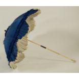 A Victorian French silk parasol, with carved ivory folding handle, marked on metal collar Cazzel,
