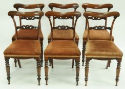 A set of six Victorian mahogany dining chairs with turned tapering legs, each stamped J.