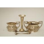 A silver cream jug and two handled sugar basin, by Mappin Brothers, Birmingham 1896, 141g (4.