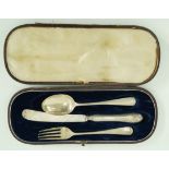 A pair of cased silver napkin rings, Birmingham 1948; with a Victorian silver knife and fork set,