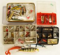 A box of assorted vintage and modern lures