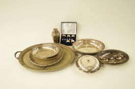 A silver plated round entrée dish, cover and handle, a pair of silver plated oval entrée dishes,