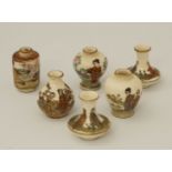 A pair of early 20th century period miniature Japanese earthenware  vases,