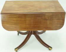 A 19th century mahogany Pembroke table, with turned support,