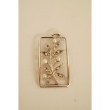 A rose cut diamond and pearl pendant, of foliate design within a rectangular frame,