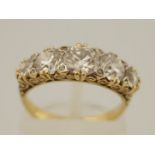 A five stone diamond ring, circa 1900, the graduated brilliant cuts totalling approximately 1.