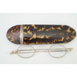 A 19th century tortoiseshell and silver mounted spectacle case,