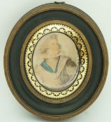 A 19th century oval ebonised concave frame, with domed verre eglomise glass,