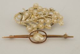 A 9ct gold and baroque pearl bar brooch ( untested and unwarranted);
