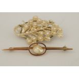 A 9ct gold and baroque pearl bar brooch ( untested and unwarranted);