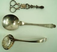 A pair of George III silver sugar nips with shell terminals,