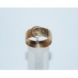 A 9ct gold buckle ring, Birmingham 1978, finger size X, 4.