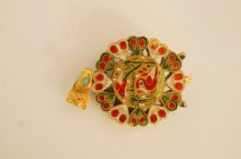 An Indian Jaipur enamel gold, turquoise and stone set pendant, of circular cluster design,