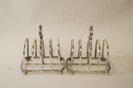 A pair of late Victorian silver toast racks, London 1900,