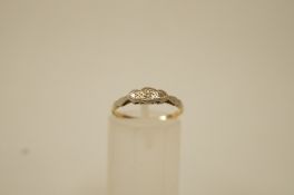 A three stone diamond ring, the single cuts illusion set, finger size K1/2, 1.